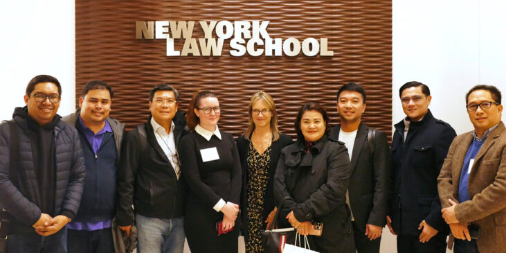 New York Law School's Professor Kim Hawkins and Caitlin Mcguire with the delegation from the Philippines.