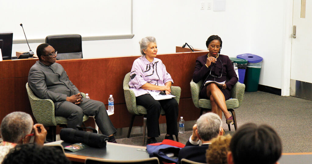 Dunstan Mlambo, Penelope Andrews, and Dianne Renwick speaking at event