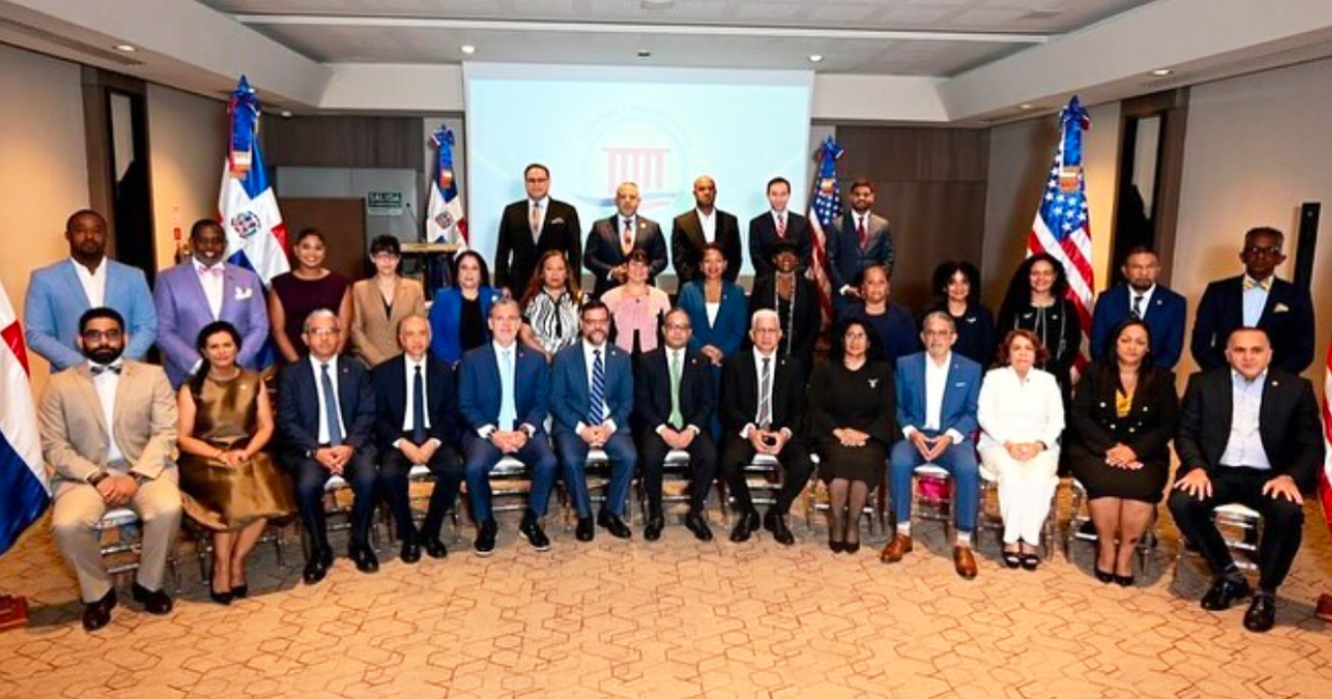 Belliard alongside members of the New York State Senate Delegation and the Constitutional Court of the Dominican Republic.