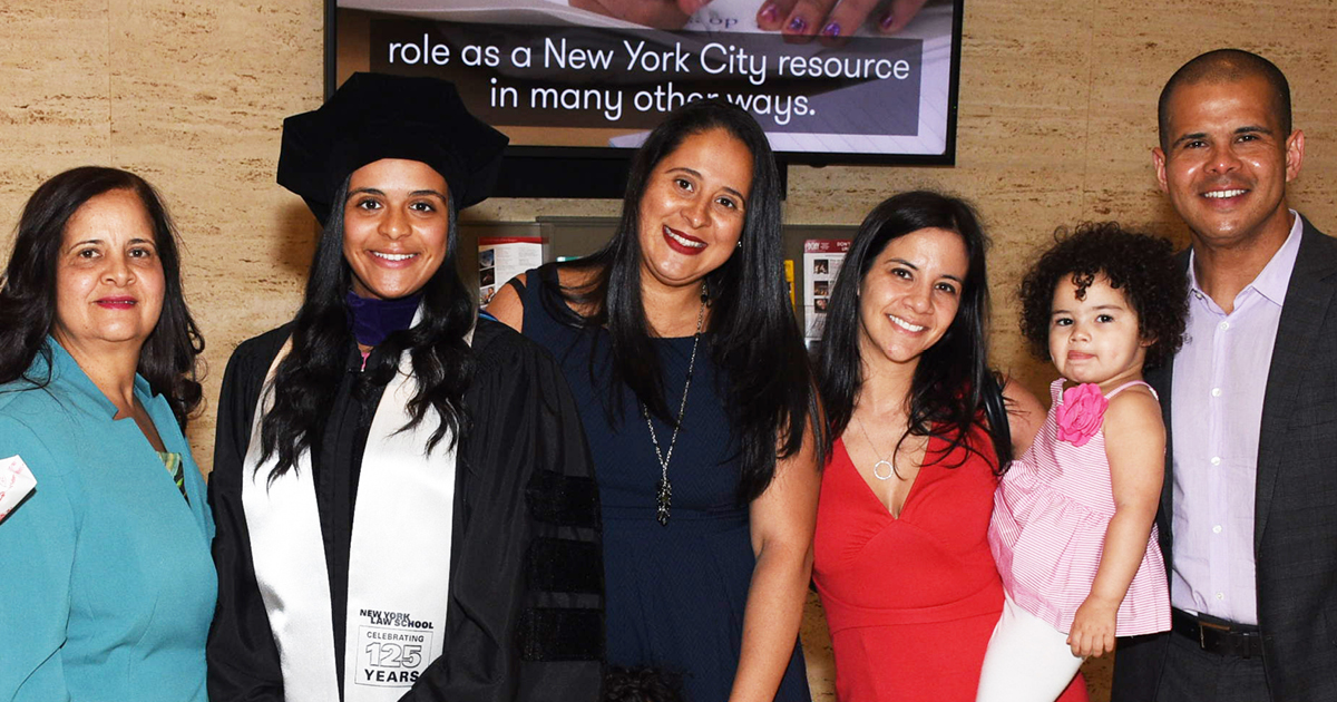 Belliard with her family at NYLS's 125th Commencement.