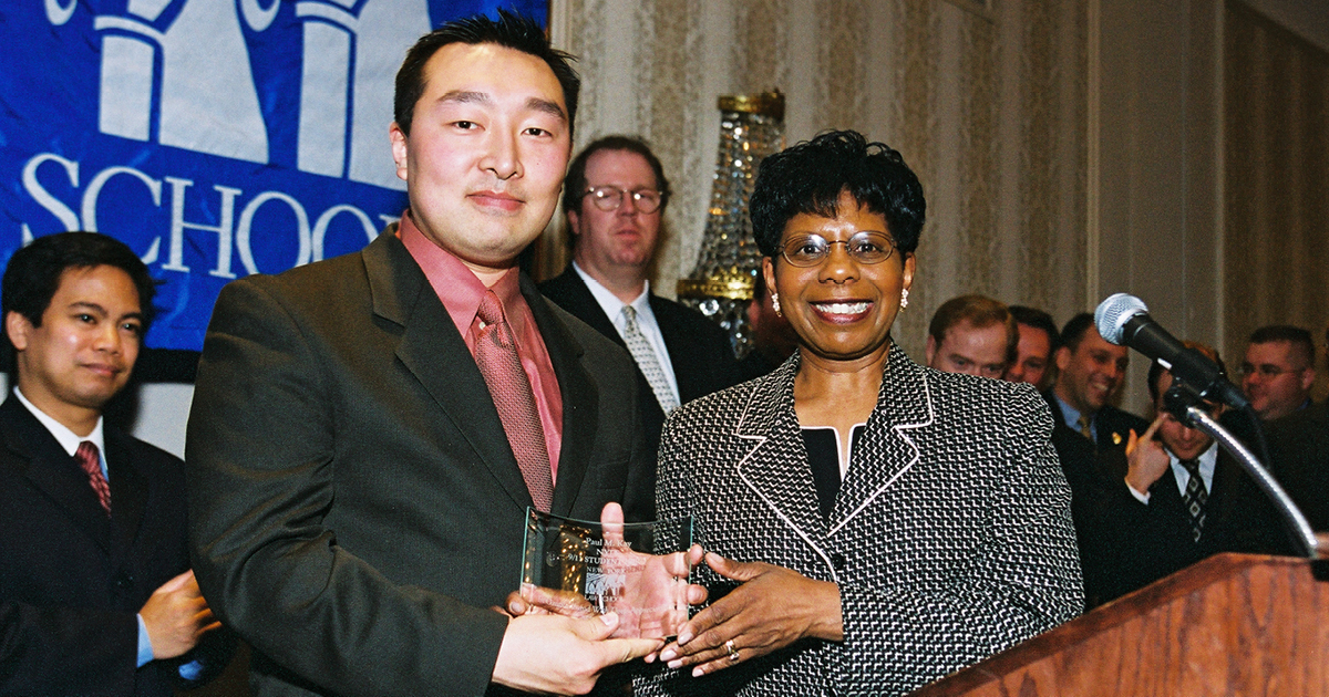 Paul M. Kay receiving Student Hero Award at the 2002 Spring Benefit Gala