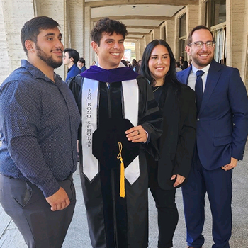 Graduate and family at New York Law School commencement