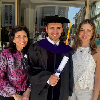 Graduate and family at New York Law School commencement