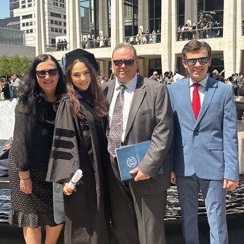 Graduate and family at New York Law School commencement