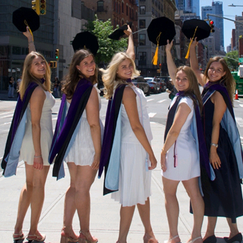 New York Law School Graduates in front of NYLS building