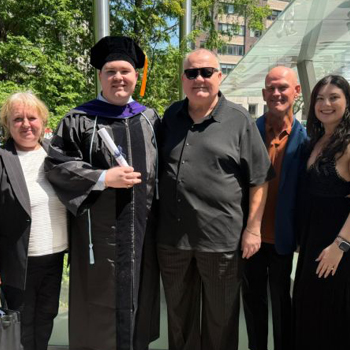 Graduate and family at New York Law School commencement